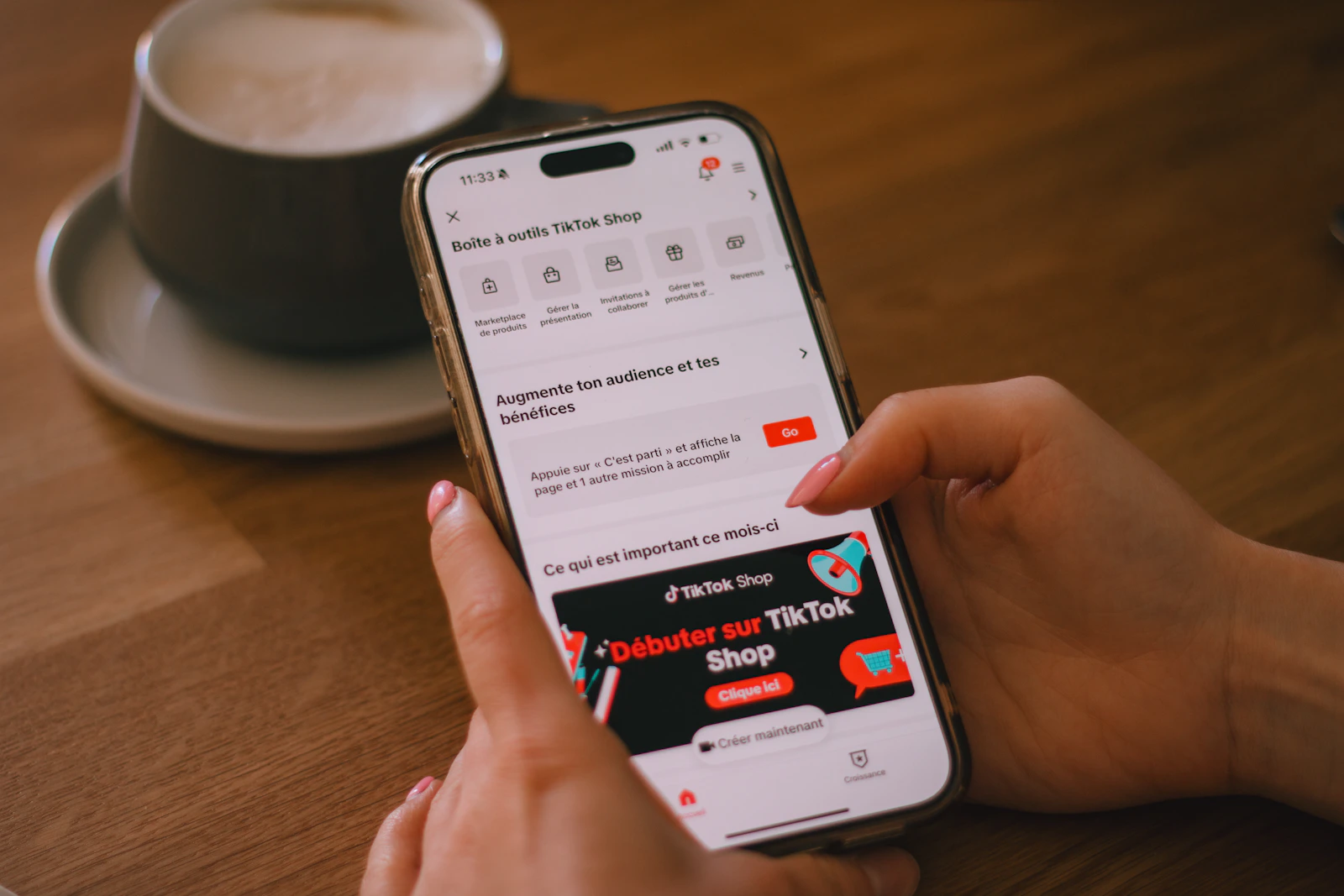 A person using the TikTok Shop app on a smartphone. Photograph by Swello via Unsplash.